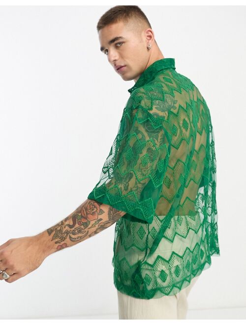 ASOS DESIGN boxy oversized shirt with embroidered aztec print in green