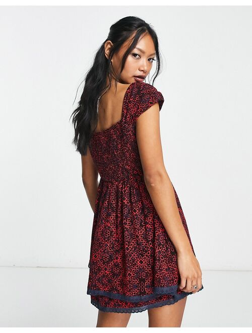 Free People ditsy floral print mini smock dress in black and red