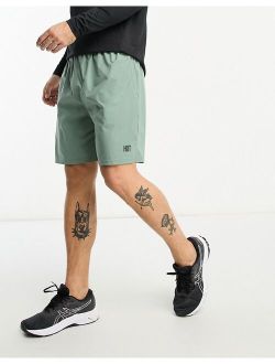 HIIT mid length training shorts in sage