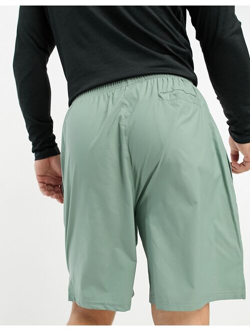 HIIT mid length training shorts in sage