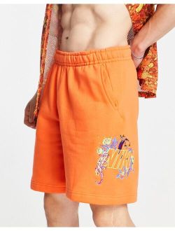 Logo Twist glow in the dark logo shorts in orange