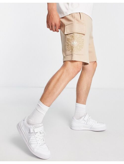 adidas Originals Graphics Ozworld cargo shorts in magic beige