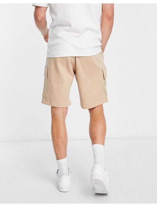 adidas Originals Graphics Ozworld cargo shorts in magic beige