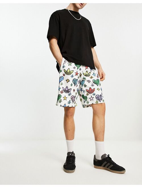 adidas Originals x Jeremy Scott 10 inch shorts in white and multi