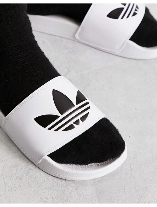 adidas Originals Adilette sliders in white