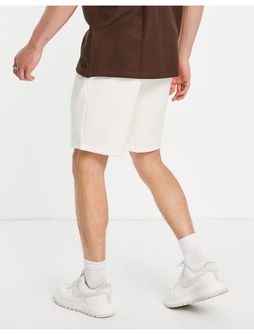 River Island slim jersey shorts in ecru