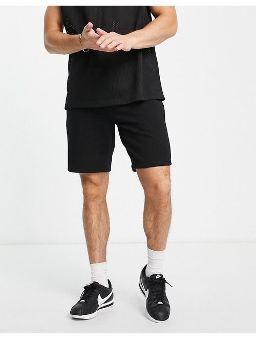 River Island slim jersey shorts in black