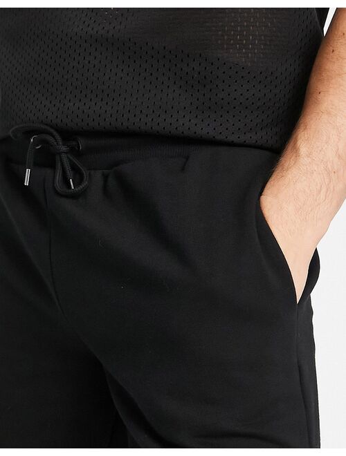 River Island slim jersey shorts in black