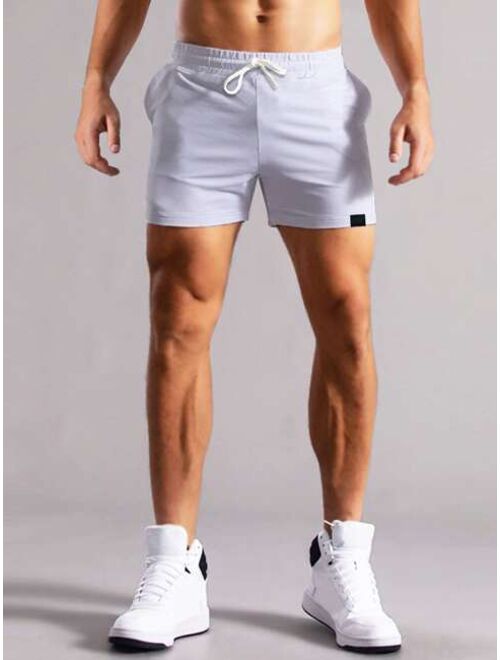 Men Patch Detail Drawstring Waist Shorts