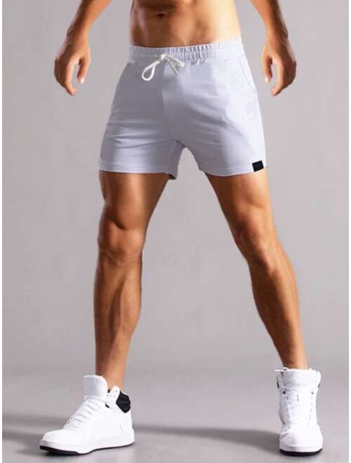 Men Patch Detail Drawstring Waist Shorts