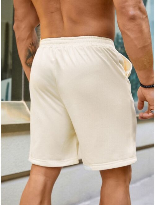 Men Solid Drawstring Waist Shorts