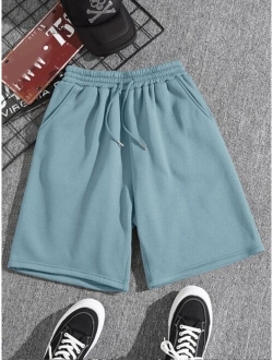 Men Drawstring Waist Slant Pocket Shorts