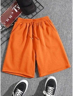 Men Drawstring Waist Slant Pocket Shorts