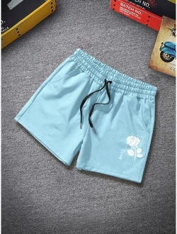 Men Rose Print Drawstring Waist Shorts