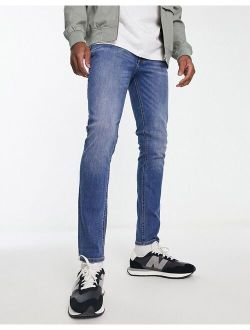 Intelligence Liam skinny jean in mid wash blue