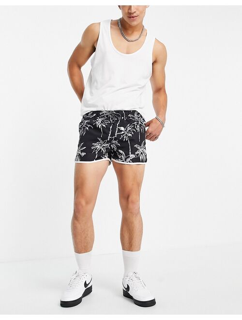 Jack & Jones Intelligence racer swim shorts in black palm print