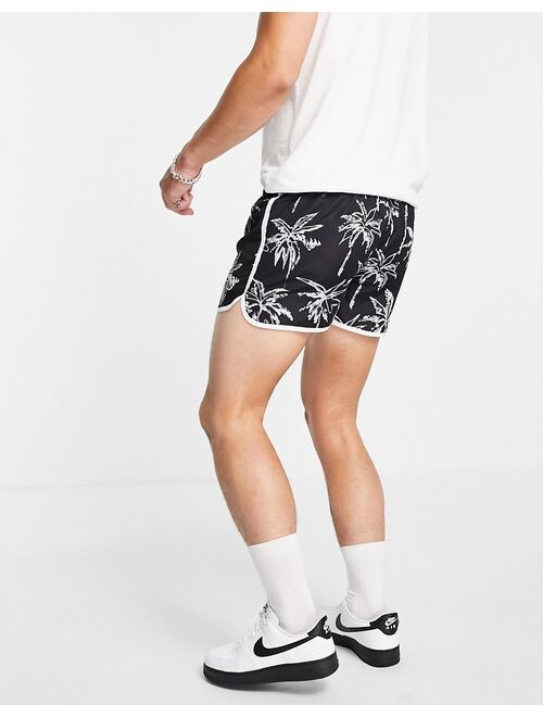 Jack & Jones Intelligence racer swim shorts in black palm print