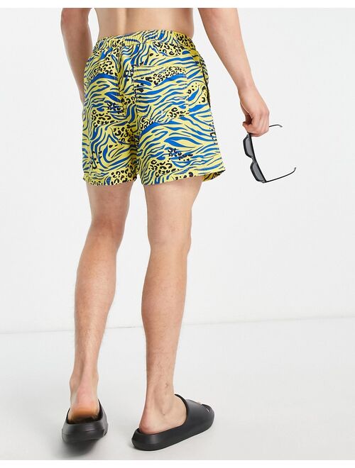 Jack & Jones Intelligence swim short in animal print in yellow