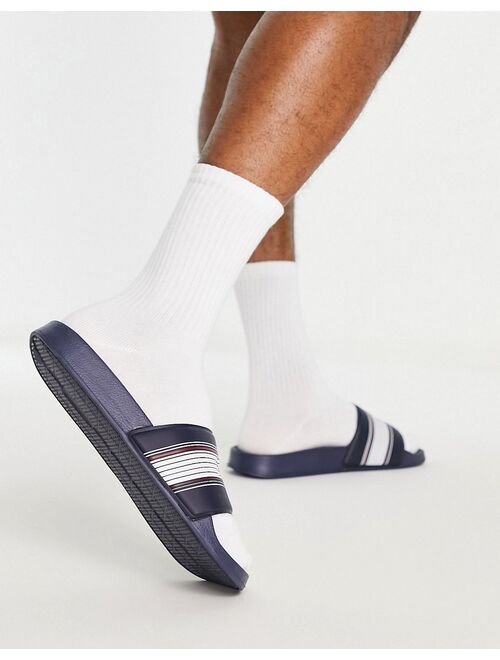 Jack & Jones logo slides in navy