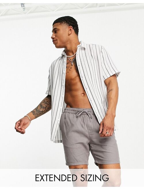 ASOS DESIGN relaxed textured stripe shirt in white