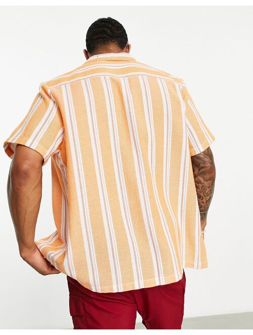 ASOS DESIGN relaxed camp collar textured stripe shirt in orange