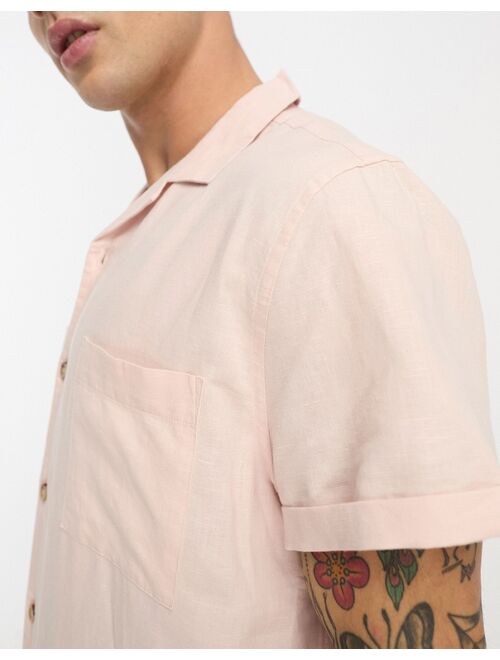 ASOS DESIGN relaxed linen shirt with double pockets in pink