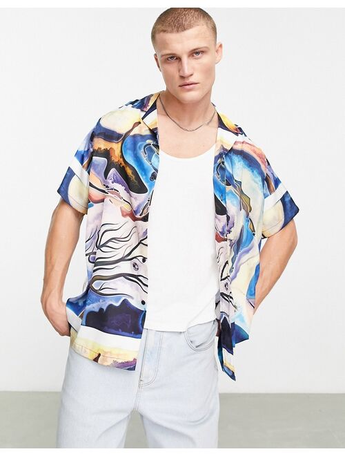 ASOS DESIGN relaxed camp collar satin shirt in abstract print