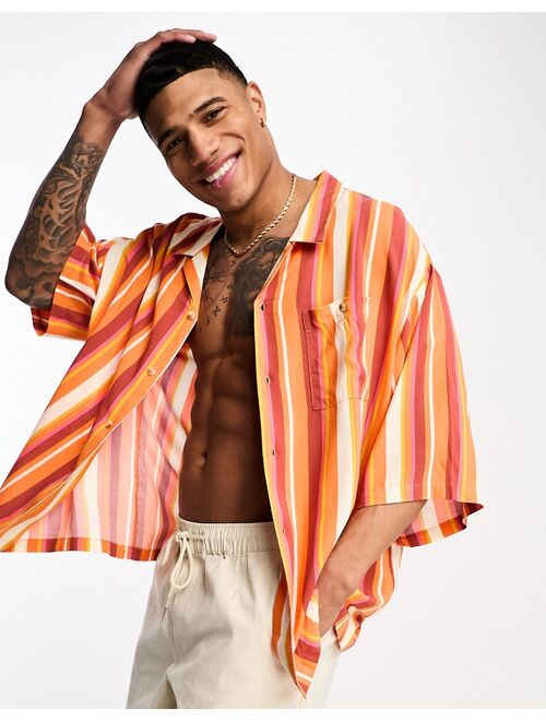 ASOS DESIGN dropped shoulder oversized revere shirt in orange stripe