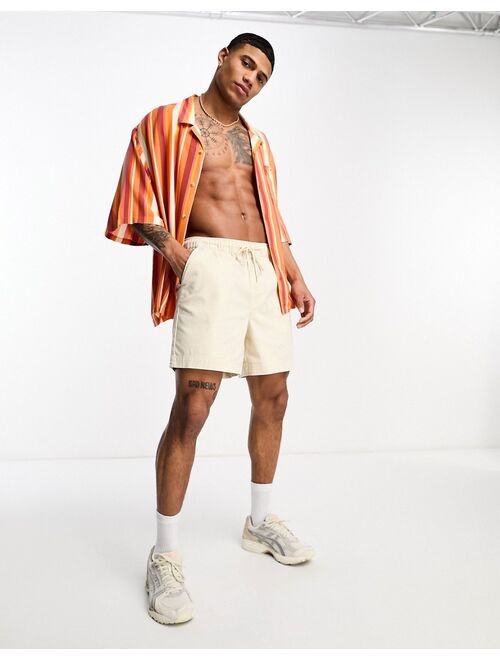 ASOS DESIGN dropped shoulder oversized revere shirt in orange stripe