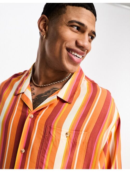 ASOS DESIGN dropped shoulder oversized revere shirt in orange stripe