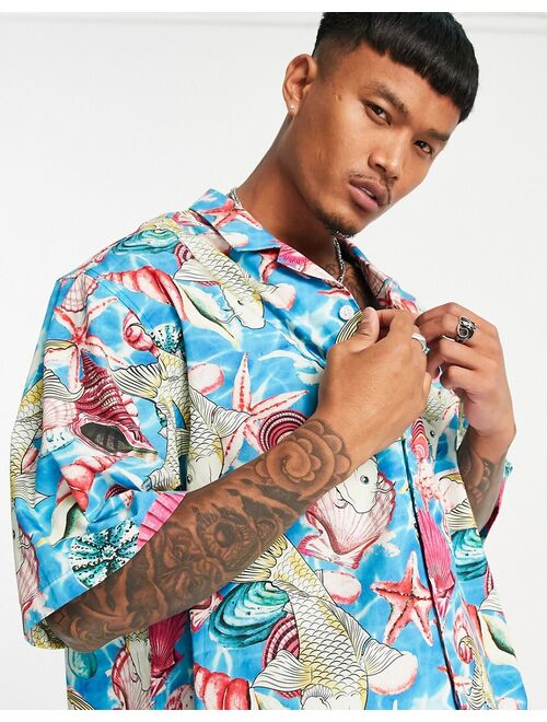 ASOS DESIGN dropped shoulder oversized camp collar shirt in shell print