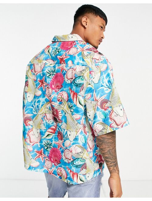 ASOS DESIGN dropped shoulder oversized camp collar shirt in shell print