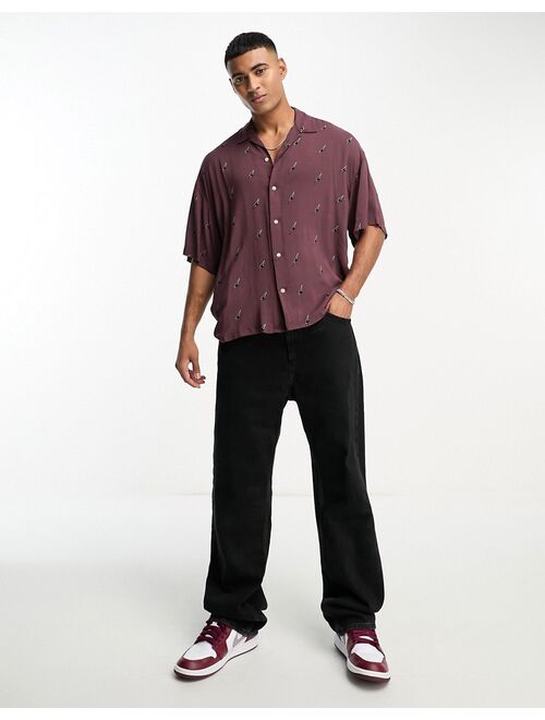 ADPT oversized revere collar short sleeve shirt with lightning print in burgundy