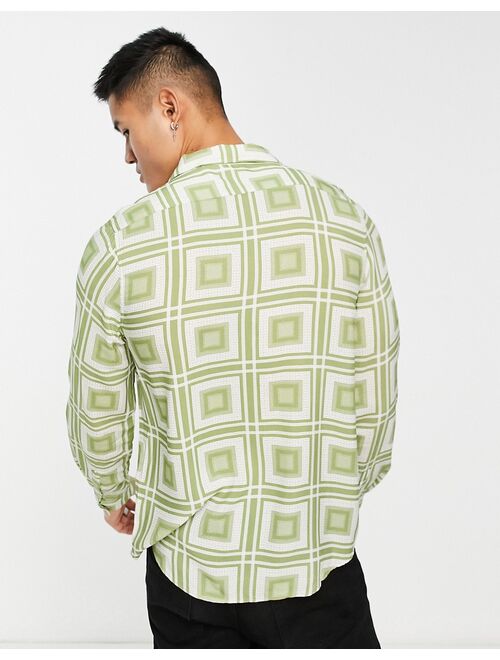 Devils Advocate long sleeve revere collar shirt in geo print in green