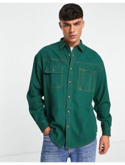 ASOS DESIGN oversized denim shirt in collegiate green