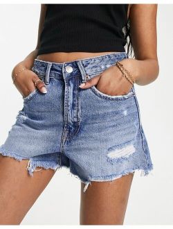 denim short with rips in medium blue