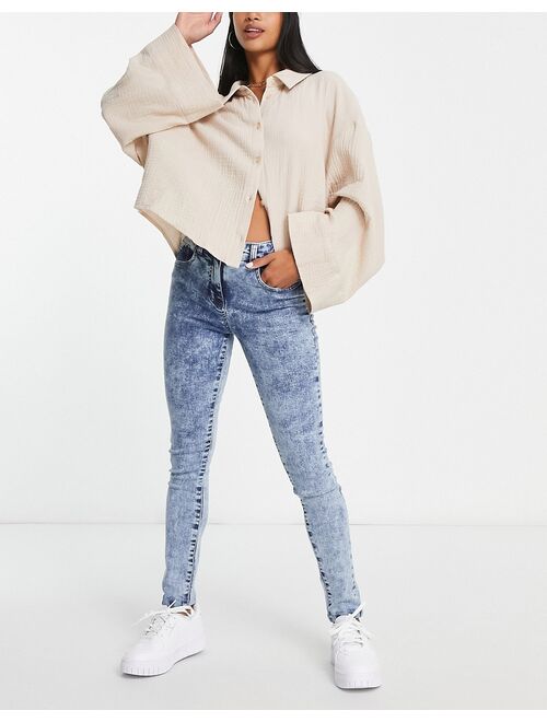 Parisian Petite skinny jeans in blue acid wash