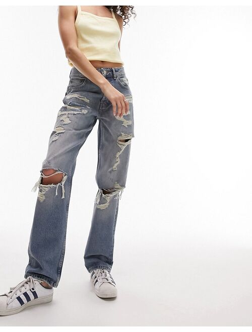 Topshop Dad jeans with extreme rip & repair in mid blue