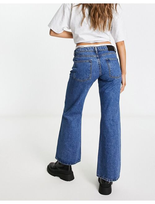 Waven low waist wide leg jeans in washed indigo