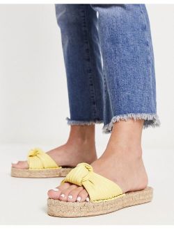 Jade knotted espadrille mules in yellow