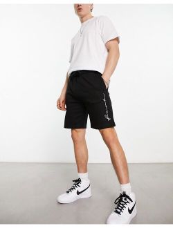 FCUK script logo jersey shorts in black