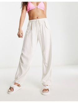 linen parachute pants in white