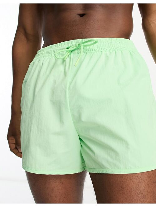 Weekday tan structure swim shorts in light green