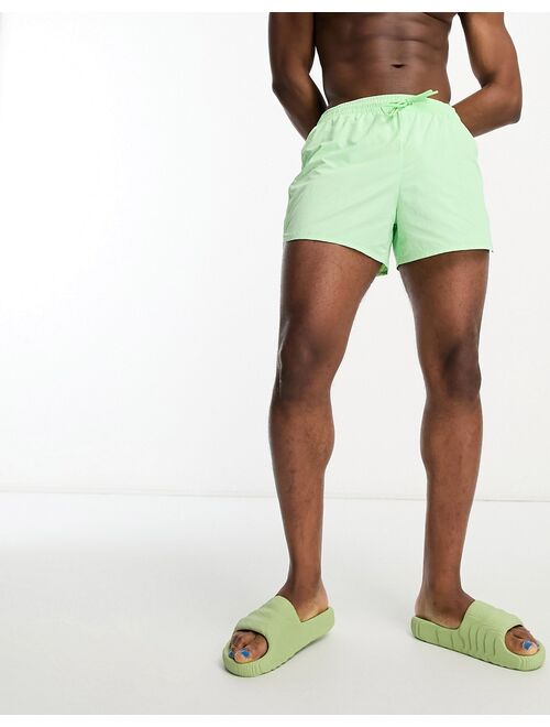 Weekday tan structure swim shorts in light green