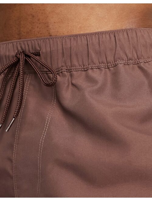 ASOS DESIGN swim shorts in short length in brown