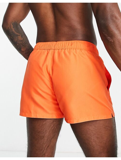 ASOS DESIGN swim shorts in super short length in orange