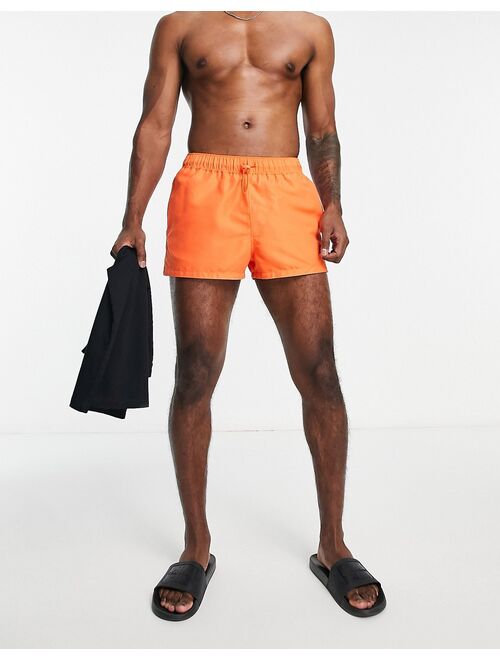 ASOS DESIGN swim shorts in super short length in orange