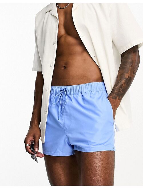 ASOS DESIGN swim shorts in super short length in blue