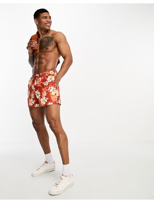 ASOS DESIGN swim shorts in short length in red floral print