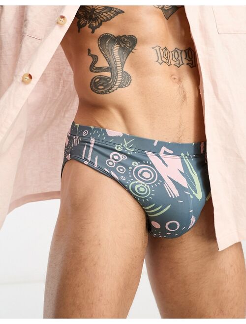 ASOS DESIGN swim trunks in scribble shape print